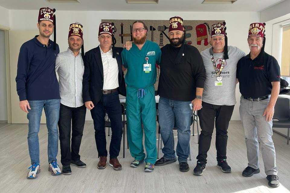 Shriners with a provider during the Cyprus Outreach Clinic